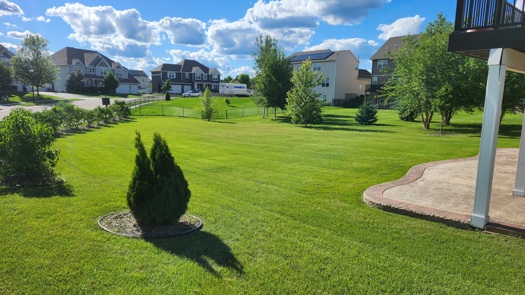 Freshly mowed backyard with clean edges by GOAT Lawn Care